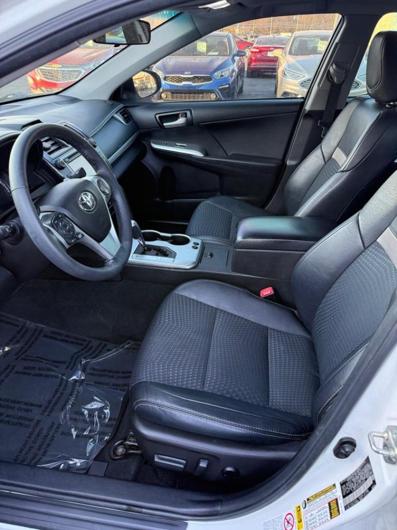 2014 WHITE TOYOTA CAMRY SE SPORT (4T1BF1FK5EU) with an 2.5L engine, Automatic transmission, located at 501 E. Columbia St., Springfield, OH, 45503, (800) 262-7122, 39.925262, -83.801796 - ***SE SPORT***New Front Brake Pads and Rotors***New Air Filter and Cabin Air Filter***Sunroof***Fresh Oil Change*** Jay North Auto has offered hand picked vehicles since 1965! Our customer's enjoy a NO pressure buying experience with a small town feel. We are a preferred dealer for many local - Photo#12