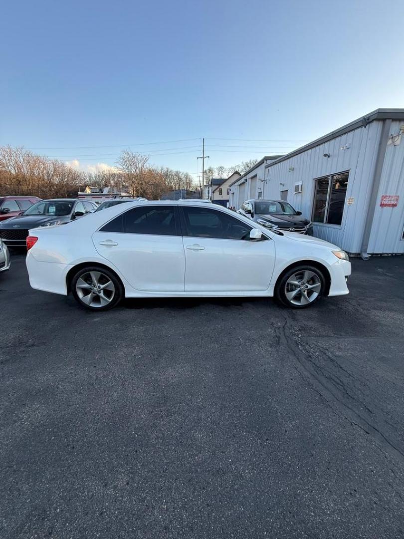 2014 WHITE TOYOTA CAMRY SE SPORT (4T1BF1FK5EU) with an 2.5L engine, Automatic transmission, located at 501 E. Columbia St., Springfield, OH, 45503, (800) 262-7122, 39.925262, -83.801796 - ***SE SPORT***New Front Brake Pads and Rotors***New Air Filter and Cabin Air Filter***Sunroof***Fresh Oil Change*** Jay North Auto has offered hand picked vehicles since 1965! Our customer's enjoy a NO pressure buying experience with a small town feel. We are a preferred dealer for many local - Photo#16