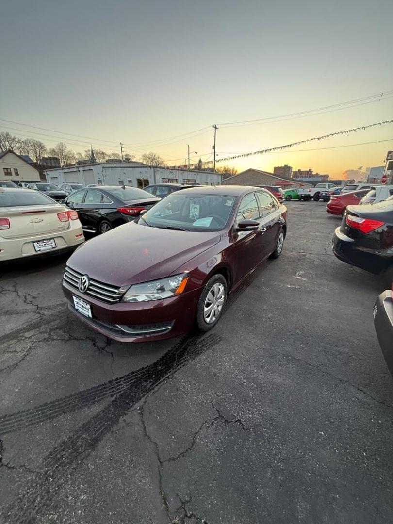2013 MAROON VOLKSWAGEN PASSAT S (1VWAP7A37DC) with an 2.5L engine, 5-Speed Manual transmission, located at 501 E. Columbia St., Springfield, OH, 45503, (800) 262-7122, 39.925262, -83.801796 - ***S***5-Speed Manual***New Tires***New Front and Rear Brake Pads and Rotors***New Battery***New Wiper Blades***New Spark Plugs***New Cabin Air Filter***Fresh Oil Change***Ready To Go!*** Jay North Auto has offered hand picked vehicles since 1965! Our customer's enjoy a NO pressure buying exper - Photo#0