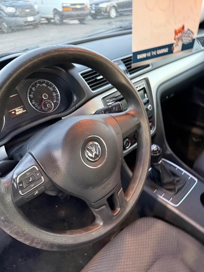 2013 MAROON VOLKSWAGEN PASSAT S (1VWAP7A37DC) with an 2.5L engine, 5-Speed Manual transmission, located at 501 E. Columbia St., Springfield, OH, 45503, (800) 262-7122, 39.925262, -83.801796 - ***S***5-Speed Manual***New Tires***New Front and Rear Brake Pads and Rotors***New Battery***New Wiper Blades***New Spark Plugs***New Cabin Air Filter***Fresh Oil Change***Ready To Go!*** Jay North Auto has offered hand picked vehicles since 1965! Our customer's enjoy a NO pressure buying exper - Photo#1