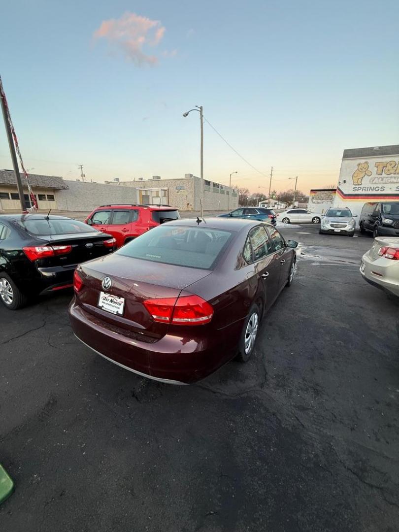 2013 MAROON VOLKSWAGEN PASSAT S (1VWAP7A37DC) with an 2.5L engine, 5-Speed Manual transmission, located at 501 E. Columbia St., Springfield, OH, 45503, (800) 262-7122, 39.925262, -83.801796 - ***S***5-Speed Manual***New Tires***New Front and Rear Brake Pads and Rotors***New Battery***New Wiper Blades***New Spark Plugs***New Cabin Air Filter***Fresh Oil Change***Ready To Go!*** Jay North Auto has offered hand picked vehicles since 1965! Our customer's enjoy a NO pressure buying exper - Photo#5