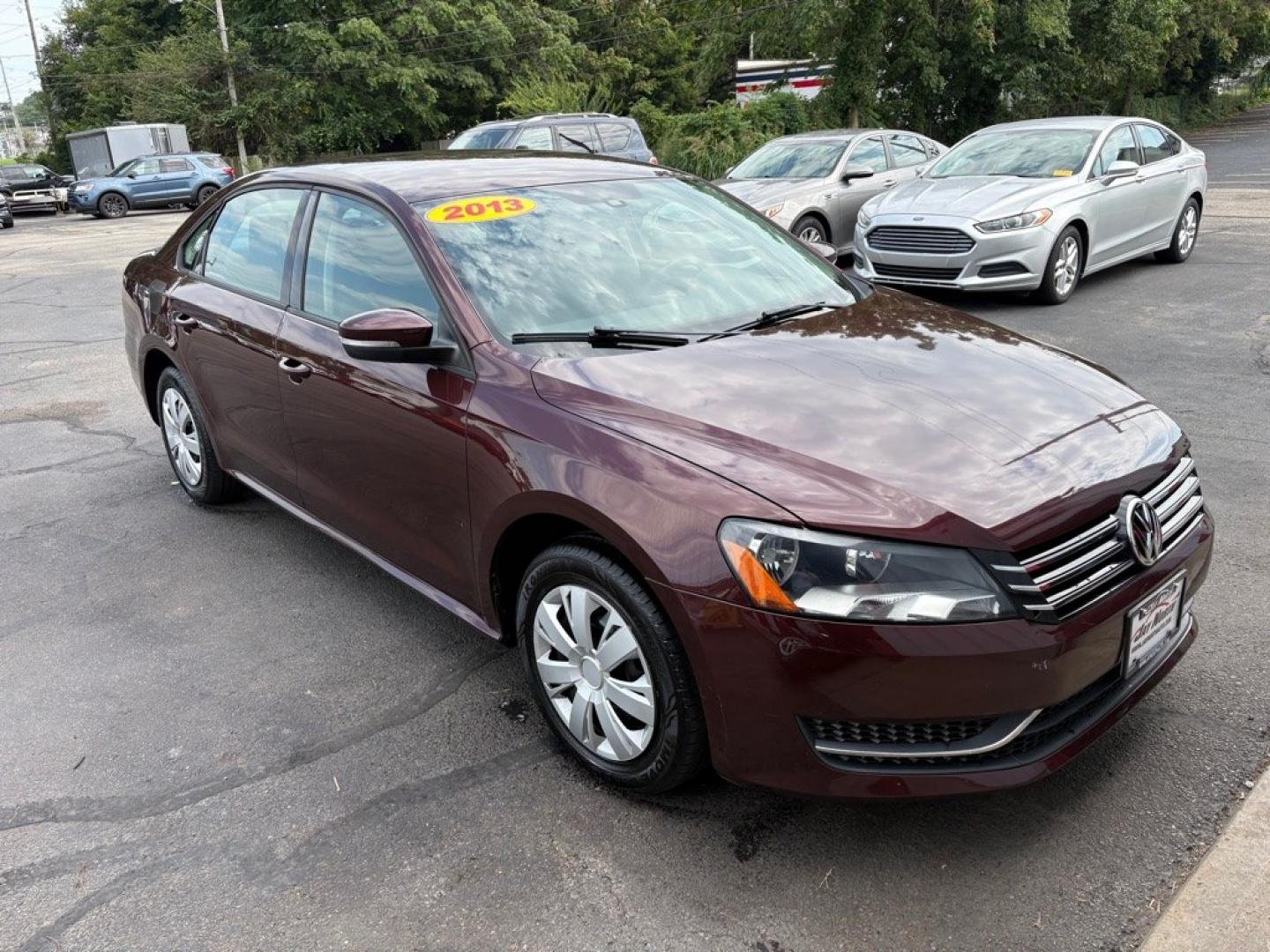 2013 MAROON VOLKSWAGEN PASSAT S (1VWAP7A37DC) with an 2.5L engine, 5-Speed Manual transmission, located at 501 E. Columbia St., Springfield, OH, 45503, (800) 262-7122, 39.925262, -83.801796 - ***S***5-Speed Manual***New Tires***New Front and Rear Brake Pads and Rotors***New Battery***New Wiper Blades***New Spark Plugs***New Cabin Air Filter***Fresh Oil Change***Ready To Go!*** Jay North Auto has offered hand picked vehicles since 1965! Our customer's enjoy a NO pressure buying exper- Photo#0
