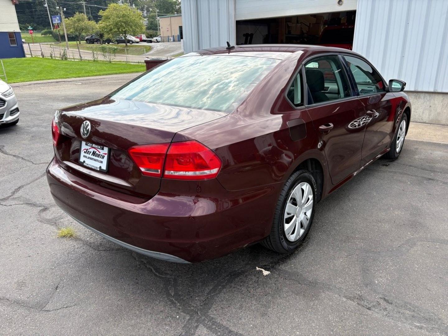 2013 MAROON VOLKSWAGEN PASSAT S (1VWAP7A37DC) with an 2.5L engine, 5-Speed Manual transmission, located at 501 E. Columbia St., Springfield, OH, 45503, (800) 262-7122, 39.925262, -83.801796 - ***S***5-Speed Manual***New Tires***New Front and Rear Brake Pads and Rotors***New Battery***New Wiper Blades***New Spark Plugs***New Cabin Air Filter***Fresh Oil Change***Ready To Go!*** Jay North Auto has offered hand picked vehicles since 1965! Our customer's enjoy a NO pressure buying exper- Photo#2