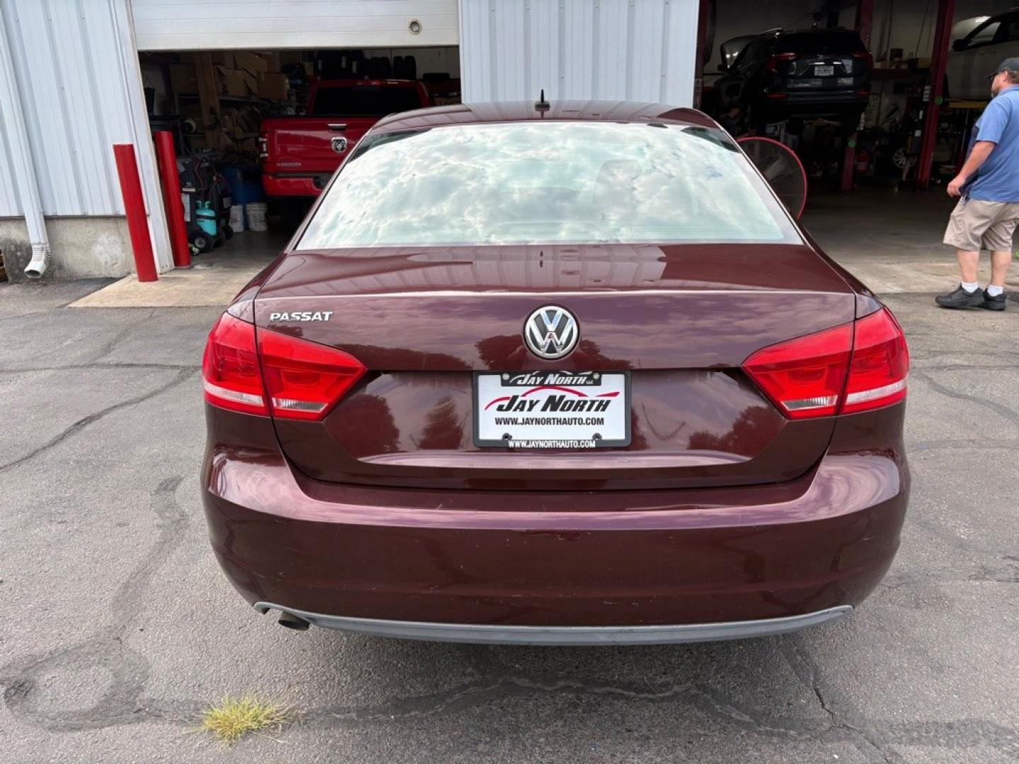 2013 MAROON VOLKSWAGEN PASSAT S (1VWAP7A37DC) with an 2.5L engine, 5-Speed Manual transmission, located at 501 E. Columbia St., Springfield, OH, 45503, (800) 262-7122, 39.925262, -83.801796 - ***S***5-Speed Manual***New Tires***New Front and Rear Brake Pads and Rotors***New Battery***New Wiper Blades***New Spark Plugs***New Cabin Air Filter***Fresh Oil Change***Ready To Go!*** Jay North Auto has offered hand picked vehicles since 1965! Our customer's enjoy a NO pressure buying exper- Photo#3