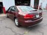 2013 MAROON VOLKSWAGEN PASSAT S (1VWAP7A37DC) with an 2.5L engine, 5-Speed Manual transmission, located at 501 E. Columbia St., Springfield, OH, 45503, (800) 262-7122, 39.925262, -83.801796 - ***S***5-Speed Manual***New Tires***New Front and Rear Brake Pads and Rotors***New Battery***New Wiper Blades***New Spark Plugs***New Cabin Air Filter***Fresh Oil Change***Ready To Go!*** Jay North Auto has offered hand picked vehicles since 1965! Our customer's enjoy a NO pressure buying exper- Photo#4