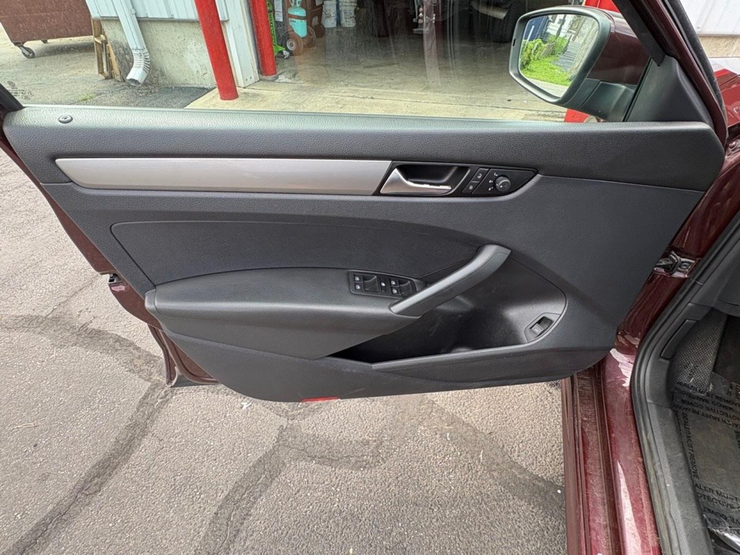 2013 MAROON VOLKSWAGEN PASSAT S (1VWAP7A37DC) with an 2.5L engine, 5-Speed Manual transmission, located at 501 E. Columbia St., Springfield, OH, 45503, (800) 262-7122, 39.925262, -83.801796 - ***S***5-Speed Manual***New Tires***New Front and Rear Brake Pads and Rotors***New Battery***New Wiper Blades***New Spark Plugs***New Cabin Air Filter***Fresh Oil Change***Ready To Go!*** Jay North Auto has offered hand picked vehicles since 1965! Our customer's enjoy a NO pressure buying exper- Photo#6