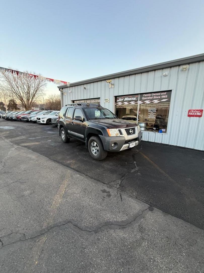 2012 BLACK NISSAN XTERRA PRO-4X OFF ROAD (5N1AN0NW4CC) with an 4.0L engine, Automatic transmission, located at 501 E. Columbia St., Springfield, OH, 45503, (800) 262-7122, 39.925262, -83.801796 - *** Clean CarFax w/ 47 Service Records ***PRO-4X OFF ROAD *** 4.0L V6 4x4 *** Leather *** Rockfordfosgate Audio ***Newer Tires *** Newer Struts *** Newer Shocks *** New Oil and filter *** New Cabin and Air filter *** NICE !!! *** New Catalytic Converter and O2 sensor *** Jay North Auto has offer - Photo#0