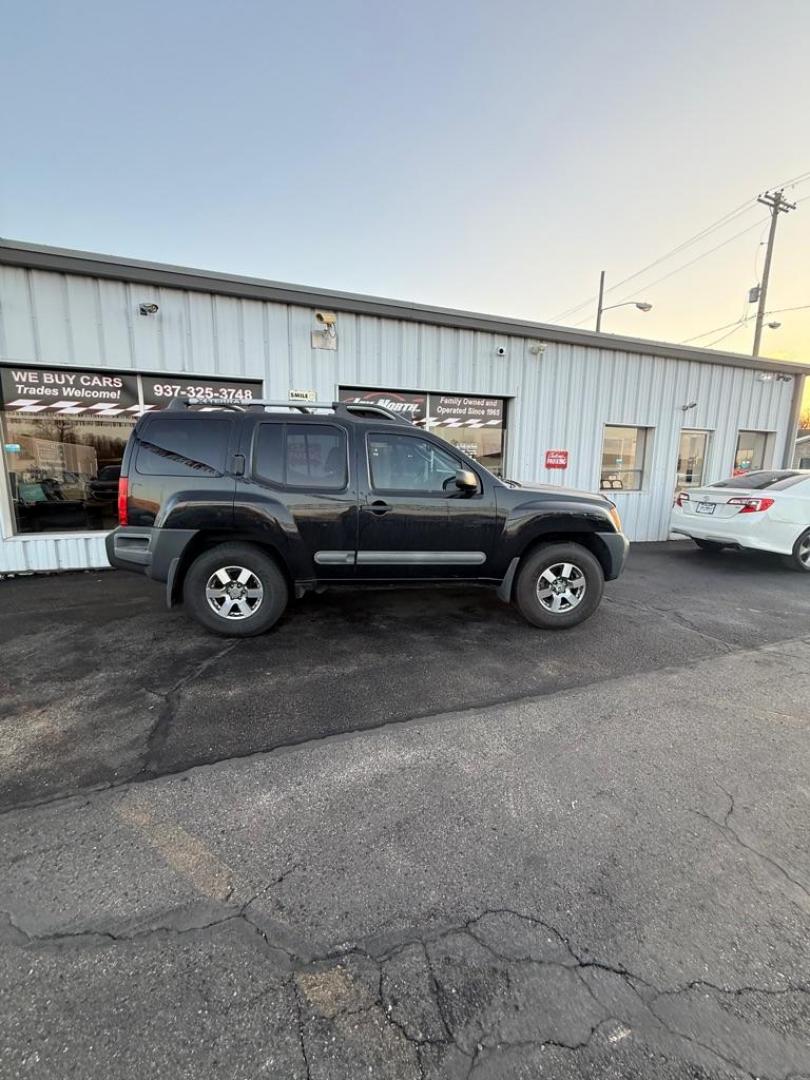 2012 BLACK NISSAN XTERRA PRO-4X OFF ROAD (5N1AN0NW4CC) with an 4.0L engine, Automatic transmission, located at 501 E. Columbia St., Springfield, OH, 45503, (800) 262-7122, 39.925262, -83.801796 - *** Clean CarFax w/ 47 Service Records ***PRO-4X OFF ROAD *** 4.0L V6 4x4 *** Leather *** Rockfordfosgate Audio ***Newer Tires *** Newer Struts *** Newer Shocks *** New Oil and filter *** New Cabin and Air filter *** NICE !!! *** New Catalytic Converter and O2 sensor *** Jay North Auto has offer - Photo#2
