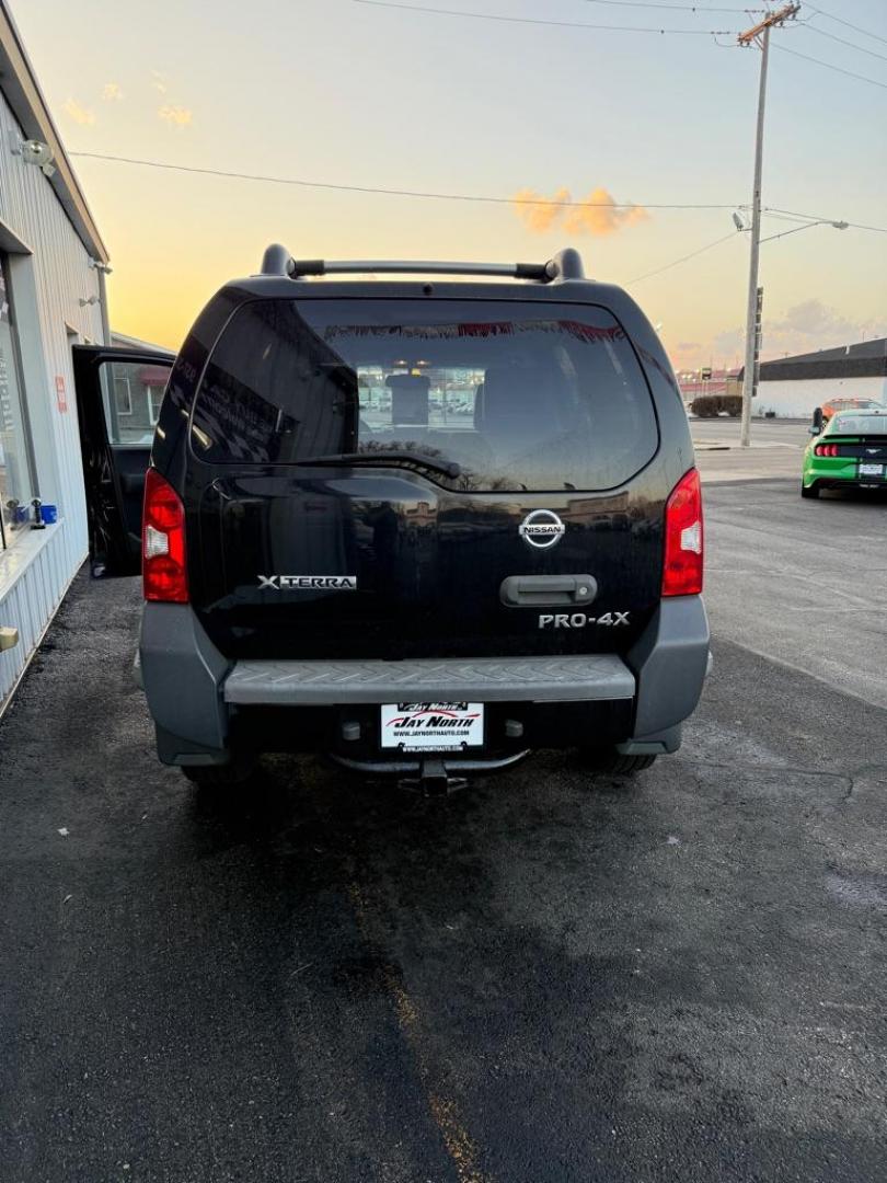 2012 BLACK NISSAN XTERRA PRO-4X OFF ROAD (5N1AN0NW4CC) with an 4.0L engine, Automatic transmission, located at 501 E. Columbia St., Springfield, OH, 45503, (800) 262-7122, 39.925262, -83.801796 - *** Clean CarFax w/ 47 Service Records ***PRO-4X OFF ROAD *** 4.0L V6 4x4 *** Leather *** Rockfordfosgate Audio ***Newer Tires *** Newer Struts *** Newer Shocks *** New Oil and filter *** New Cabin and Air filter *** NICE !!! *** New Catalytic Converter and O2 sensor *** Jay North Auto has offer - Photo#3