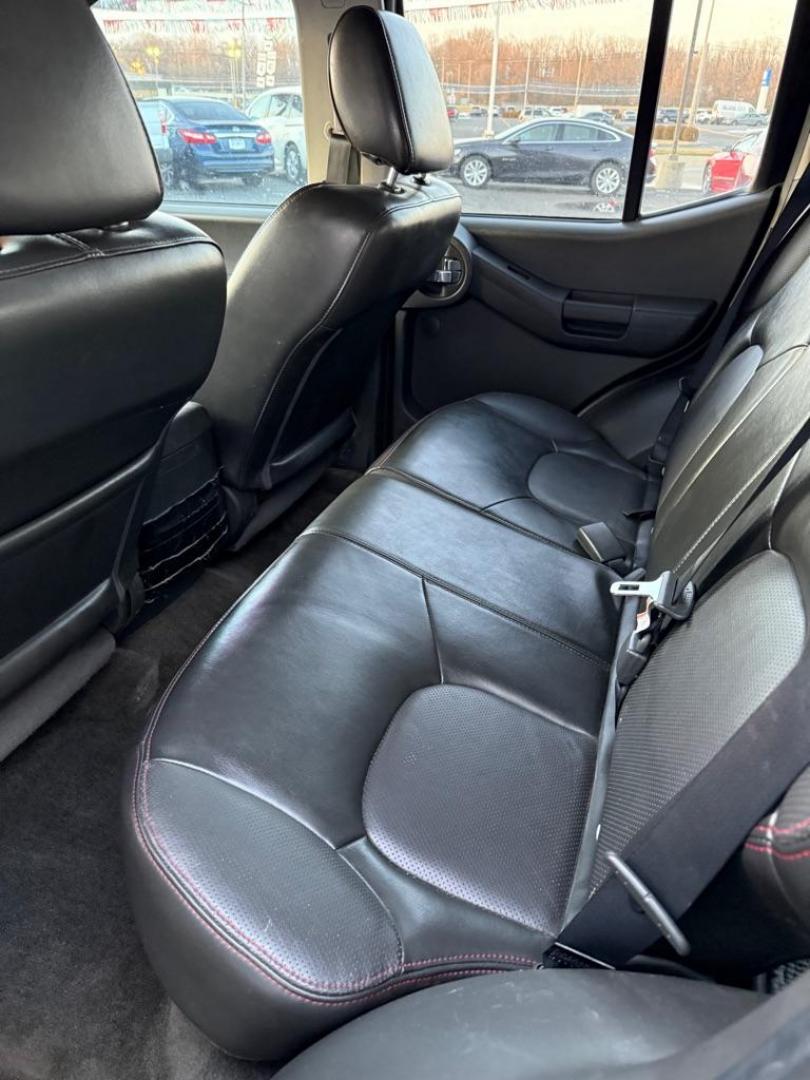 2012 BLACK NISSAN XTERRA PRO-4X OFF ROAD (5N1AN0NW4CC) with an 4.0L engine, Automatic transmission, located at 501 E. Columbia St., Springfield, OH, 45503, (800) 262-7122, 39.925262, -83.801796 - *** Clean CarFax w/ 47 Service Records ***PRO-4X OFF ROAD *** 4.0L V6 4x4 *** Leather *** Rockfordfosgate Audio ***Newer Tires *** Newer Struts *** Newer Shocks *** New Oil and filter *** New Cabin and Air filter *** NICE !!! *** New Catalytic Converter and O2 sensor *** Jay North Auto has offer - Photo#6