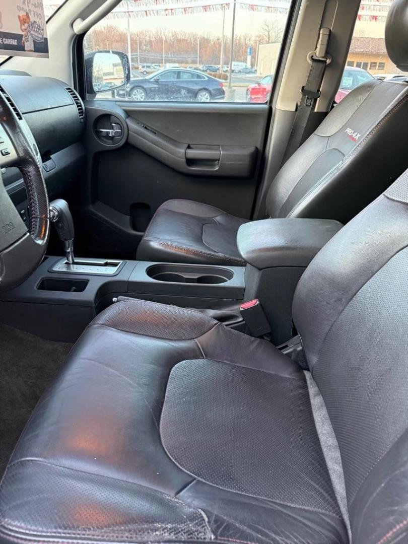 2012 BLACK NISSAN XTERRA PRO-4X OFF ROAD (5N1AN0NW4CC) with an 4.0L engine, Automatic transmission, located at 501 E. Columbia St., Springfield, OH, 45503, (800) 262-7122, 39.925262, -83.801796 - *** Clean CarFax w/ 47 Service Records ***PRO-4X OFF ROAD *** 4.0L V6 4x4 *** Leather *** Rockfordfosgate Audio ***Newer Tires *** Newer Struts *** Newer Shocks *** New Oil and filter *** New Cabin and Air filter *** NICE !!! *** New Catalytic Converter and O2 sensor *** Jay North Auto has offer - Photo#9