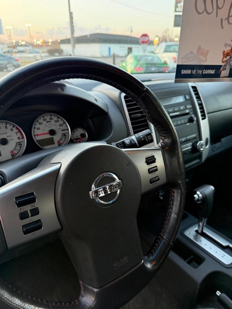 2012 BLACK NISSAN XTERRA PRO-4X OFF ROAD (5N1AN0NW4CC) with an 4.0L engine, Automatic transmission, located at 501 E. Columbia St., Springfield, OH, 45503, (800) 262-7122, 39.925262, -83.801796 - *** Clean CarFax w/ 47 Service Records ***PRO-4X OFF ROAD *** 4.0L V6 4x4 *** Leather *** Rockfordfosgate Audio ***Newer Tires *** Newer Struts *** Newer Shocks *** New Oil and filter *** New Cabin and Air filter *** NICE !!! *** New Catalytic Converter and O2 sensor *** Jay North Auto has offer - Photo#10