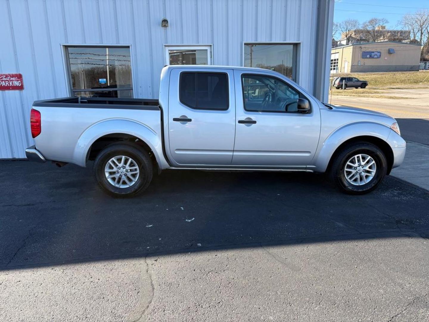 2015 SILVER NISSAN FRONTIER SV CREW CAB (1N6AD0ER4FN) with an 4.0L engine, Automatic transmission, located at 501 E. Columbia St., Springfield, OH, 45503, (800) 262-7122, 39.925262, -83.801796 - ***SV***Crew Cab***New Air Filter and Cabin Air Filter***New Front Brake Pads and Rotors***New Wipers***Fresh Oil Change*** Jay North Auto has offered hand picked vehicles since 1965! Our customer's enjoy a NO pressure buying experience with a small town feel. We are a preferred dealer for ma - Photo#1