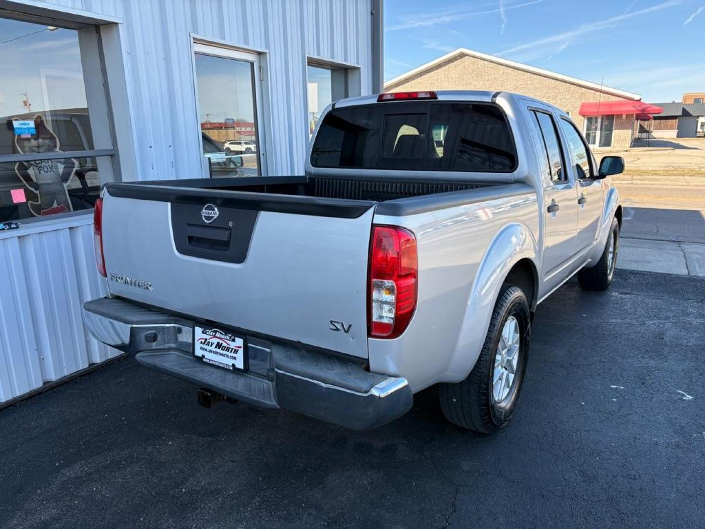 2015 SILVER NISSAN FRONTIER SV CREW CAB (1N6AD0ER4FN) with an 4.0L engine, Automatic transmission, located at 501 E. Columbia St., Springfield, OH, 45503, (800) 262-7122, 39.925262, -83.801796 - ***SV***Crew Cab***New Air Filter and Cabin Air Filter***New Front Brake Pads and Rotors***New Wipers***Fresh Oil Change*** Jay North Auto has offered hand picked vehicles since 1965! Our customer's enjoy a NO pressure buying experience with a small town feel. We are a preferred dealer for ma - Photo#2