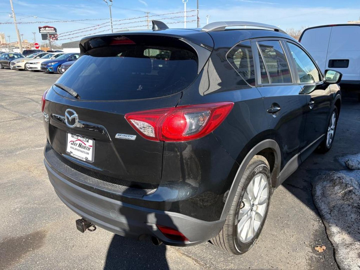 2015 BLACK MAZDA CX-5 GRAND TOURING (JM3KE4DY7F0) with an 2.5L engine, Automatic transmission, located at 501 E. Columbia St., Springfield, OH, 45503, (800) 262-7122, 39.925262, -83.801796 - ***1-Owner***Clean Carfax***Grand Touring***Leather Seating***Sunroof***AWD***Brakes***New Spark Plugs*** Jay North Auto has offered hand picked vehicles since 1965! Our customer's enjoy a NO pressure buying experience with a small town feel. We are a preferred dealer for many local credit un - Photo#1