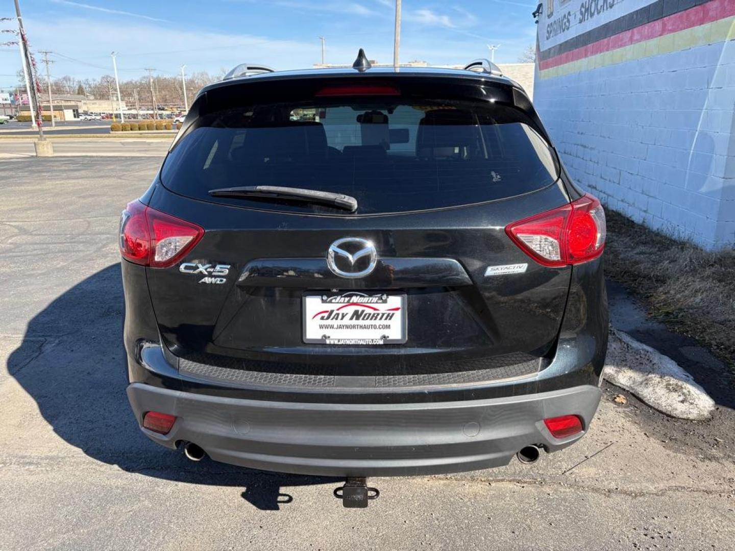 2015 BLACK MAZDA CX-5 GRAND TOURING (JM3KE4DY7F0) with an 2.5L engine, Automatic transmission, located at 501 E. Columbia St., Springfield, OH, 45503, (800) 262-7122, 39.925262, -83.801796 - ***1-Owner***Clean Carfax***Grand Touring***Leather Seating***Sunroof***AWD***Brakes***New Spark Plugs*** Jay North Auto has offered hand picked vehicles since 1965! Our customer's enjoy a NO pressure buying experience with a small town feel. We are a preferred dealer for many local credit un - Photo#2