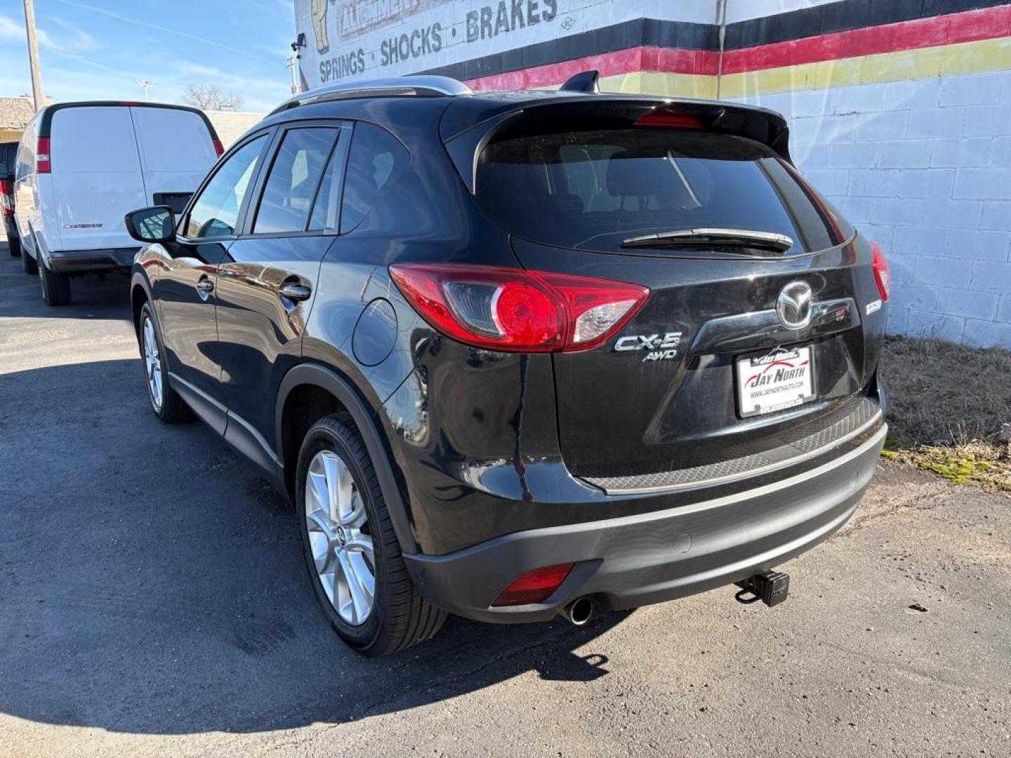 2015 BLACK MAZDA CX-5 GRAND TOURING (JM3KE4DY7F0) with an 2.5L engine, Automatic transmission, located at 501 E. Columbia St., Springfield, OH, 45503, (800) 262-7122, 39.925262, -83.801796 - ***1-Owner***Clean Carfax***Grand Touring***Leather Seating***Sunroof***AWD***Brakes***New Spark Plugs*** Jay North Auto has offered hand picked vehicles since 1965! Our customer's enjoy a NO pressure buying experience with a small town feel. We are a preferred dealer for many local credit un - Photo#3