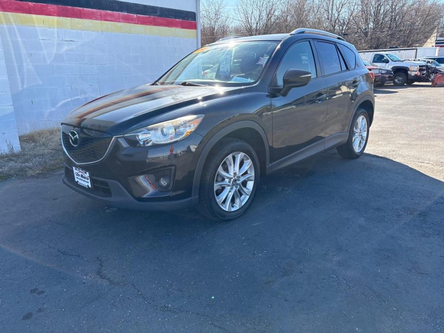 2015 BLACK MAZDA CX-5 GRAND TOURING (JM3KE4DY7F0) with an 2.5L engine, Automatic transmission, located at 501 E. Columbia St., Springfield, OH, 45503, (800) 262-7122, 39.925262, -83.801796 - ***1-Owner***Clean Carfax***Grand Touring***Leather Seating***Sunroof***AWD***Brakes***New Spark Plugs*** Jay North Auto has offered hand picked vehicles since 1965! Our customer's enjoy a NO pressure buying experience with a small town feel. We are a preferred dealer for many local credit un - Photo#4
