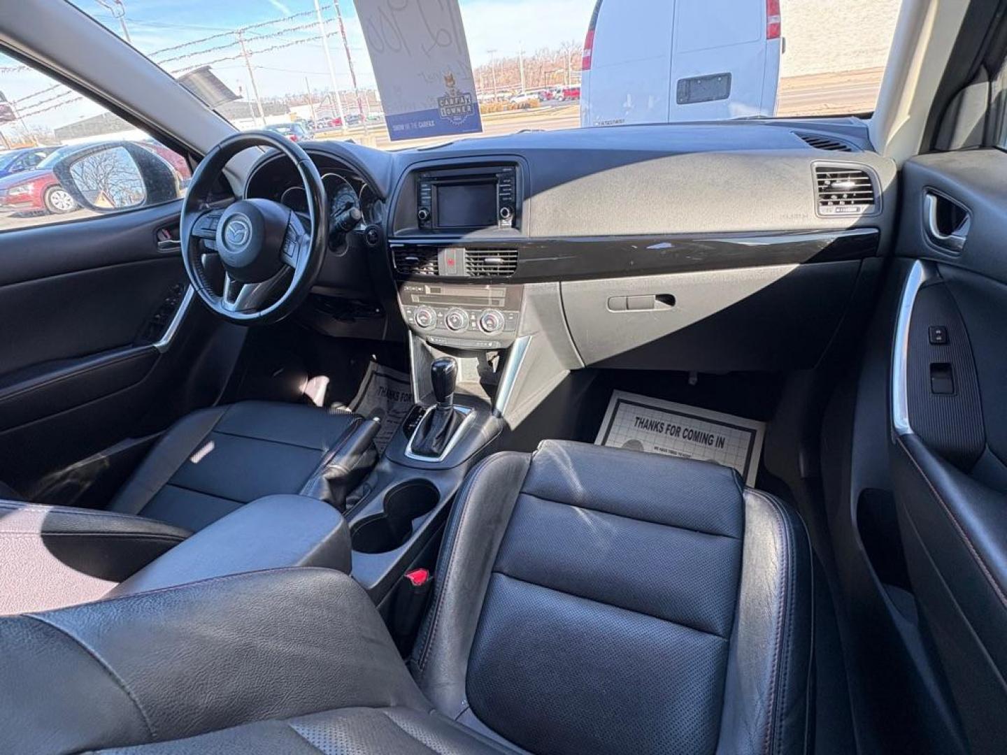 2015 BLACK MAZDA CX-5 GRAND TOURING (JM3KE4DY7F0) with an 2.5L engine, Automatic transmission, located at 501 E. Columbia St., Springfield, OH, 45503, (800) 262-7122, 39.925262, -83.801796 - ***1-Owner***Clean Carfax***Grand Touring***Leather Seating***Sunroof***AWD***Brakes***New Spark Plugs*** Jay North Auto has offered hand picked vehicles since 1965! Our customer's enjoy a NO pressure buying experience with a small town feel. We are a preferred dealer for many local credit un - Photo#17