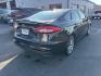 2019 BLACK FORD FUSION TITANIUM HYBRID (3FA6P0RU7KR) with an 2.0L engine, Continuously Variable transmission, located at 501 E. Columbia St., Springfield, OH, 45503, (800) 262-7122, 39.925262, -83.801796 - ***Clean Carfax***TITANIUM HYBRID***Heated and Cooled Leather Seating***Moonroof***Blind Spot***LOADED***New Tires***All New Pads and Rotors***New Spark Plugs*** Jay North Auto has offered hand picked vehicles since 1965! Our customer's enjoy a NO pressure buying experience with a small town f - Photo#2