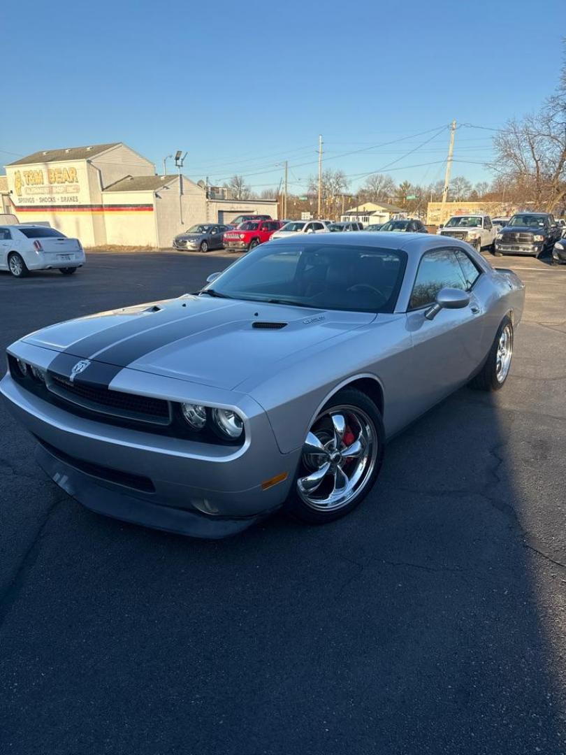 2009 SILVER DODGE CHALLENGER SRT-8 (2B3LJ74W59H) with an 6.1L engine, 6-Speed Manual transmission, located at 501 E. Columbia St., Springfield, OH, 45503, (800) 262-7122, 39.925262, -83.801796 - *** SRT 8 *** 6.1L *** Loaded *** 6 Speed Manual *** RWD *** Clean CarFax *** Oil and Filter Chage *** Cabin and Air filter *** Custom Wheels *** Jay North Auto has offered hand picked vehicles since 1965! Our customer's enjoy a NO pressure buying experience with a small town feel. We are a pr - Photo#0