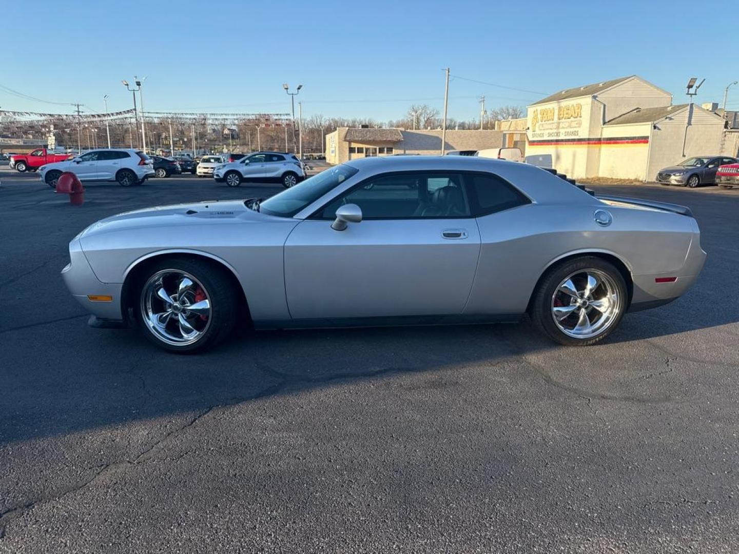 2009 SILVER DODGE CHALLENGER SRT-8 (2B3LJ74W59H) with an 6.1L engine, 6-Speed Manual transmission, located at 501 E. Columbia St., Springfield, OH, 45503, (800) 262-7122, 39.925262, -83.801796 - *** SRT 8 *** 6.1L *** Loaded *** 6 Speed Manual *** RWD *** Clean CarFax *** Oil and Filter Chage *** Cabin and Air filter *** Custom Wheels *** Jay North Auto has offered hand picked vehicles since 1965! Our customer's enjoy a NO pressure buying experience with a small town feel. We are a pr - Photo#1