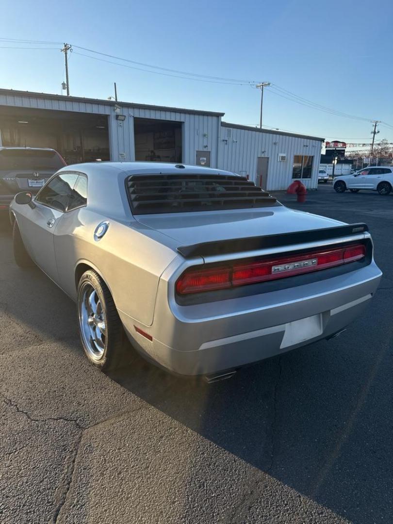 2009 SILVER DODGE CHALLENGER SRT-8 (2B3LJ74W59H) with an 6.1L engine, 6-Speed Manual transmission, located at 501 E. Columbia St., Springfield, OH, 45503, (800) 262-7122, 39.925262, -83.801796 - *** SRT 8 *** 6.1L *** Loaded *** 6 Speed Manual *** RWD *** Clean CarFax *** Oil and Filter Chage *** Cabin and Air filter *** Custom Wheels *** Jay North Auto has offered hand picked vehicles since 1965! Our customer's enjoy a NO pressure buying experience with a small town feel. We are a pr - Photo#3