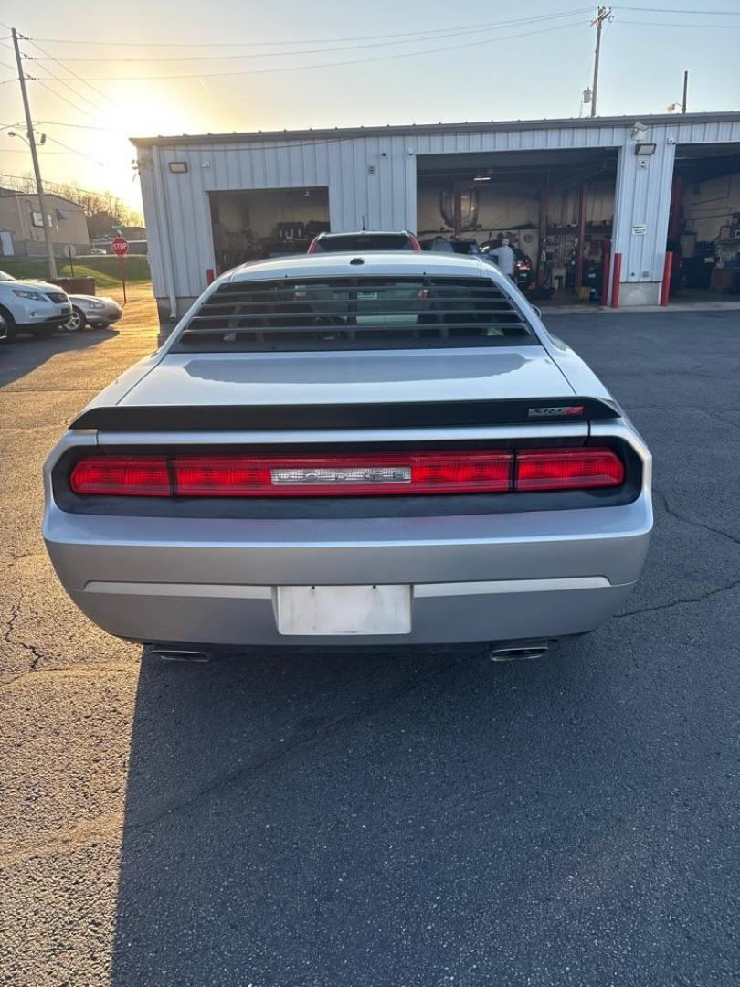 2009 SILVER DODGE CHALLENGER SRT-8 (2B3LJ74W59H) with an 6.1L engine, 6-Speed Manual transmission, located at 501 E. Columbia St., Springfield, OH, 45503, (800) 262-7122, 39.925262, -83.801796 - *** SRT 8 *** 6.1L *** Loaded *** 6 Speed Manual *** RWD *** Clean CarFax *** Oil and Filter Chage *** Cabin and Air filter *** Custom Wheels *** Jay North Auto has offered hand picked vehicles since 1965! Our customer's enjoy a NO pressure buying experience with a small town feel. We are a pr - Photo#4