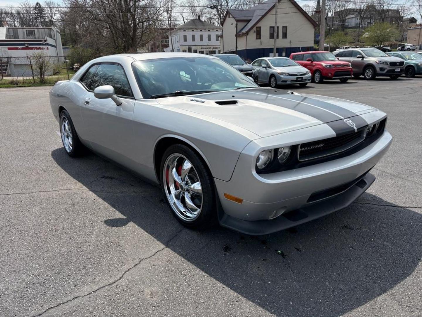 2009 SILVER DODGE CHALLENGER SRT-8 (2B3LJ74W59H) with an 6.1L engine, 6-Speed Manual transmission, located at 501 E. Columbia St., Springfield, OH, 45503, (800) 262-7122, 39.925262, -83.801796 - *** SRT 8 *** 6.1L *** Loaded *** 6 Speed Manual *** RWD *** Clean CarFax *** Oil and Filter Chage *** Cabin and Air filter *** Custom Wheels *** Jay North Auto has offered hand picked vehicles since 1965! Our customer's enjoy a NO pressure buying experience with a small town feel. We are a pr - Photo#0