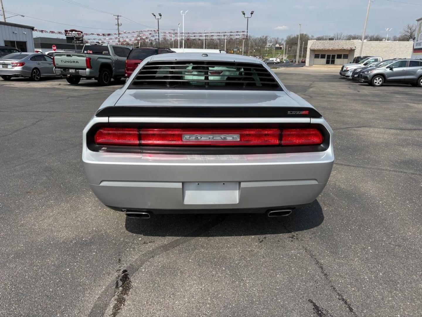 2009 SILVER DODGE CHALLENGER SRT-8 (2B3LJ74W59H) with an 6.1L engine, 6-Speed Manual transmission, located at 501 E. Columbia St., Springfield, OH, 45503, (800) 262-7122, 39.925262, -83.801796 - *** SRT 8 *** 6.1L *** Loaded *** 6 Speed Manual *** RWD *** Clean CarFax *** Oil and Filter Chage *** Cabin and Air filter *** Custom Wheels *** Jay North Auto has offered hand picked vehicles since 1965! Our customer's enjoy a NO pressure buying experience with a small town feel. We are a pr - Photo#3