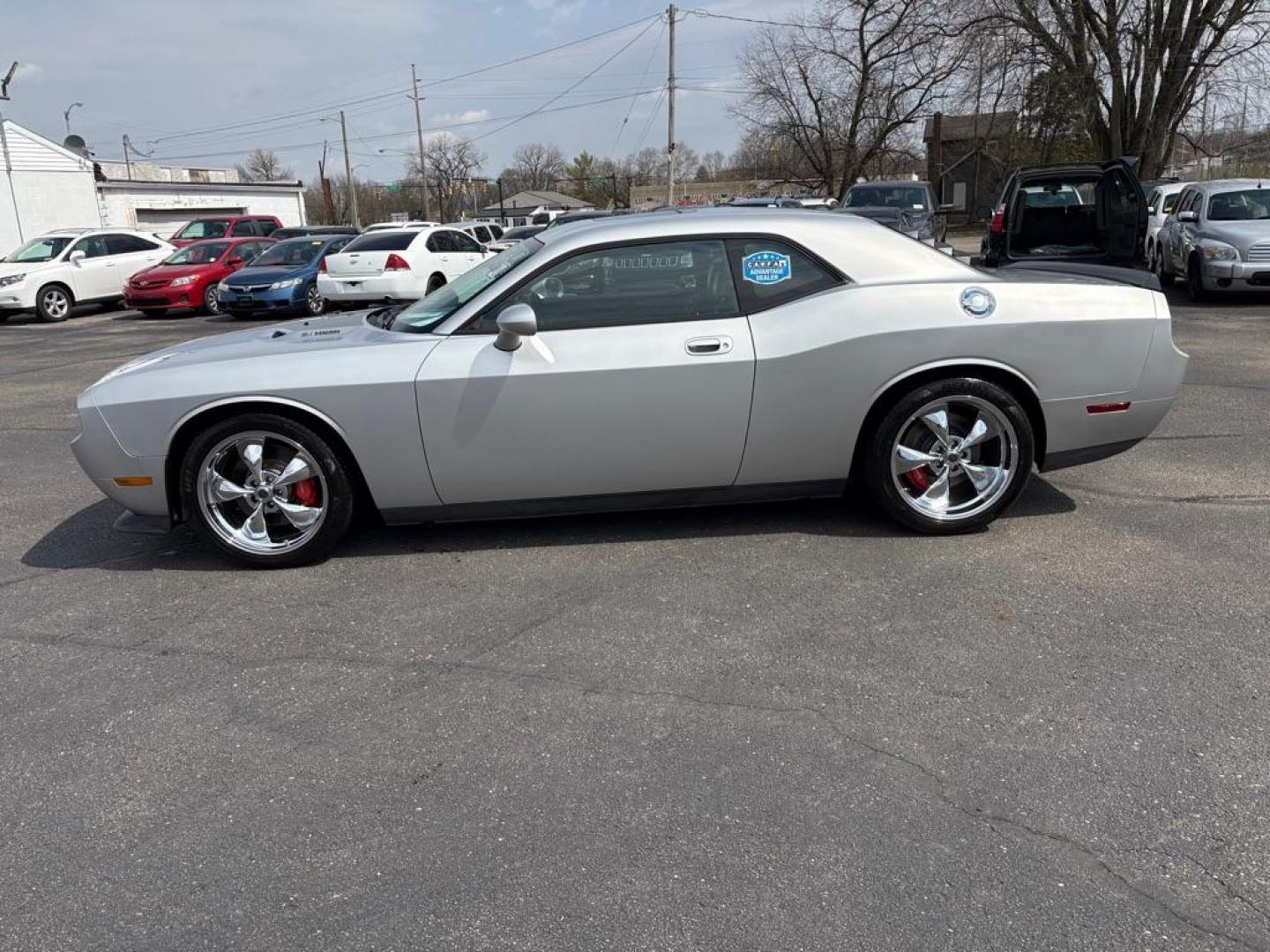 2009 SILVER DODGE CHALLENGER SRT-8 (2B3LJ74W59H) with an 6.1L engine, 6-Speed Manual transmission, located at 501 E. Columbia St., Springfield, OH, 45503, (800) 262-7122, 39.925262, -83.801796 - *** SRT 8 *** 6.1L *** Loaded *** 6 Speed Manual *** RWD *** Clean CarFax *** Oil and Filter Chage *** Cabin and Air filter *** Custom Wheels *** Jay North Auto has offered hand picked vehicles since 1965! Our customer's enjoy a NO pressure buying experience with a small town feel. We are a pr - Photo#5