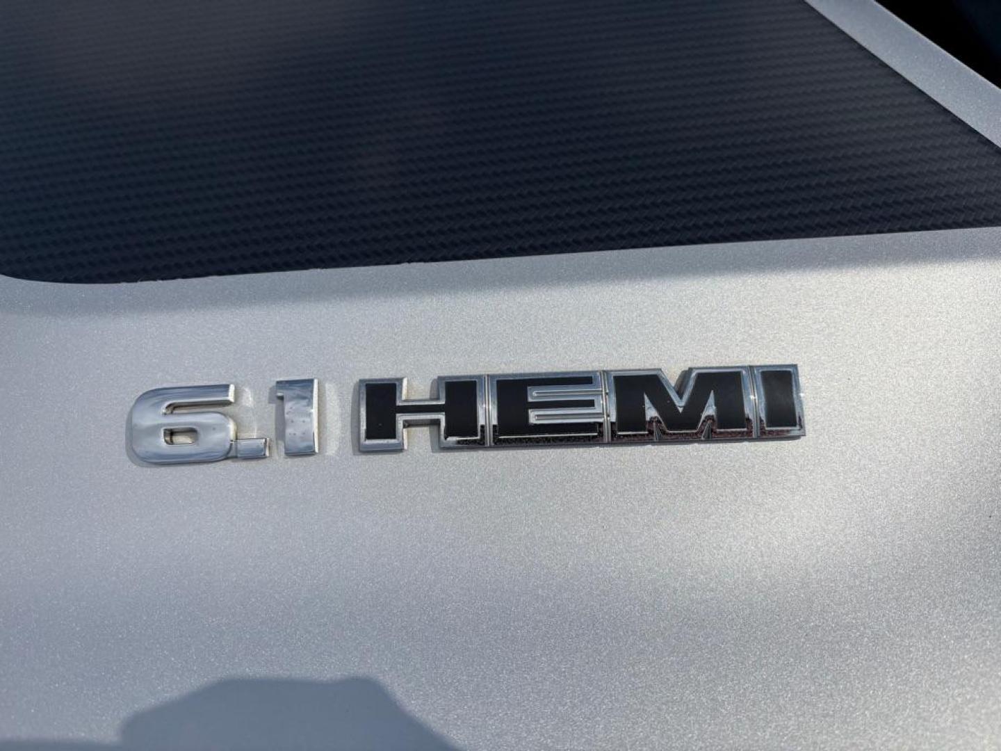 2009 SILVER DODGE CHALLENGER SRT-8 (2B3LJ74W59H) with an 6.1L engine, 6-Speed Manual transmission, located at 501 E. Columbia St., Springfield, OH, 45503, (800) 262-7122, 39.925262, -83.801796 - *** SRT 8 *** 6.1L *** Loaded *** 6 Speed Manual *** RWD *** Clean CarFax *** Oil and Filter Chage *** Cabin and Air filter *** Custom Wheels *** Jay North Auto has offered hand picked vehicles since 1965! Our customer's enjoy a NO pressure buying experience with a small town feel. We are a pr - Photo#8