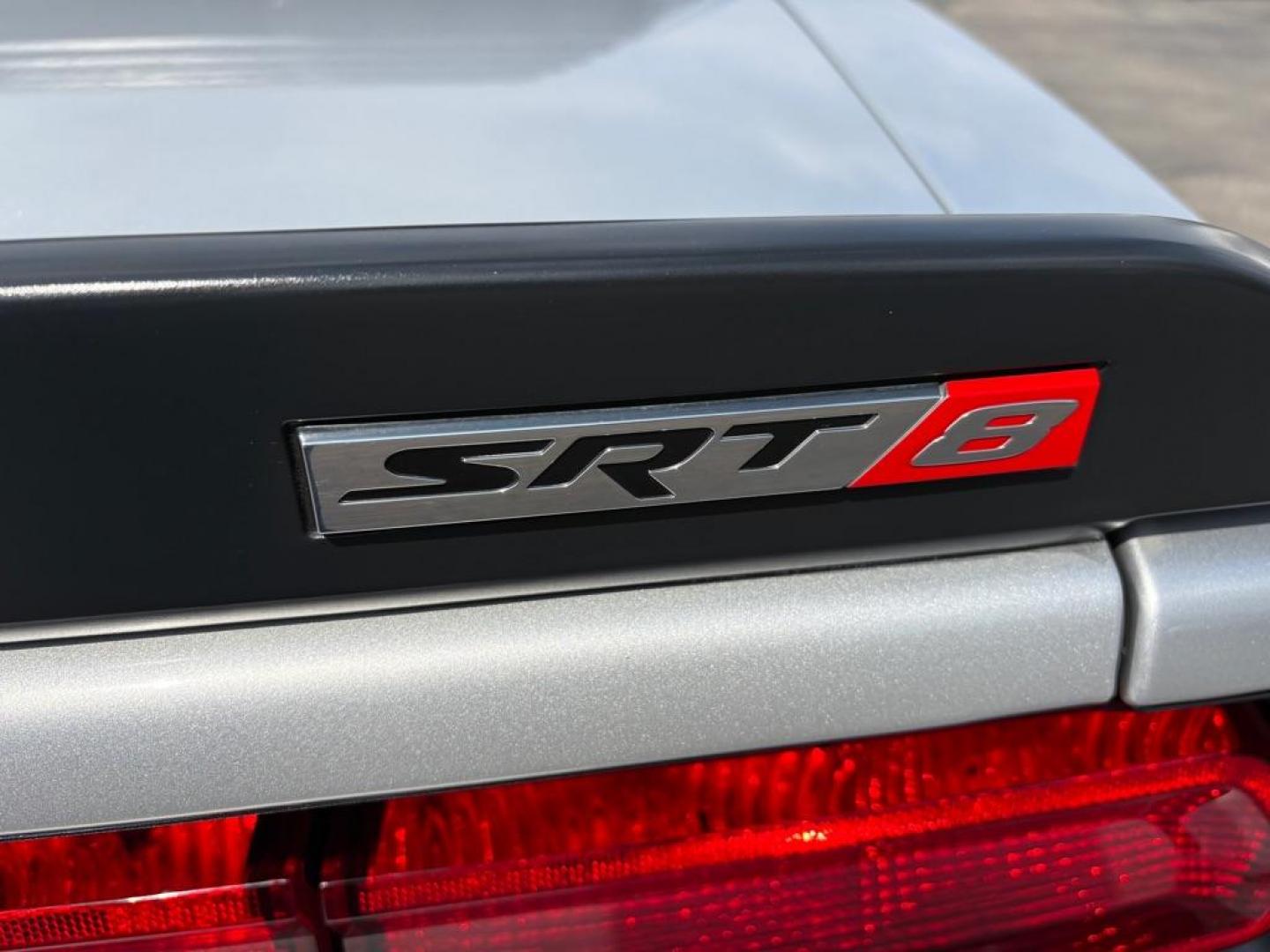 2009 SILVER DODGE CHALLENGER SRT-8 (2B3LJ74W59H) with an 6.1L engine, 6-Speed Manual transmission, located at 501 E. Columbia St., Springfield, OH, 45503, (800) 262-7122, 39.925262, -83.801796 - *** SRT 8 *** 6.1L *** Loaded *** 6 Speed Manual *** RWD *** Clean CarFax *** Oil and Filter Chage *** Cabin and Air filter *** Custom Wheels *** Jay North Auto has offered hand picked vehicles since 1965! Our customer's enjoy a NO pressure buying experience with a small town feel. We are a pr - Photo#9