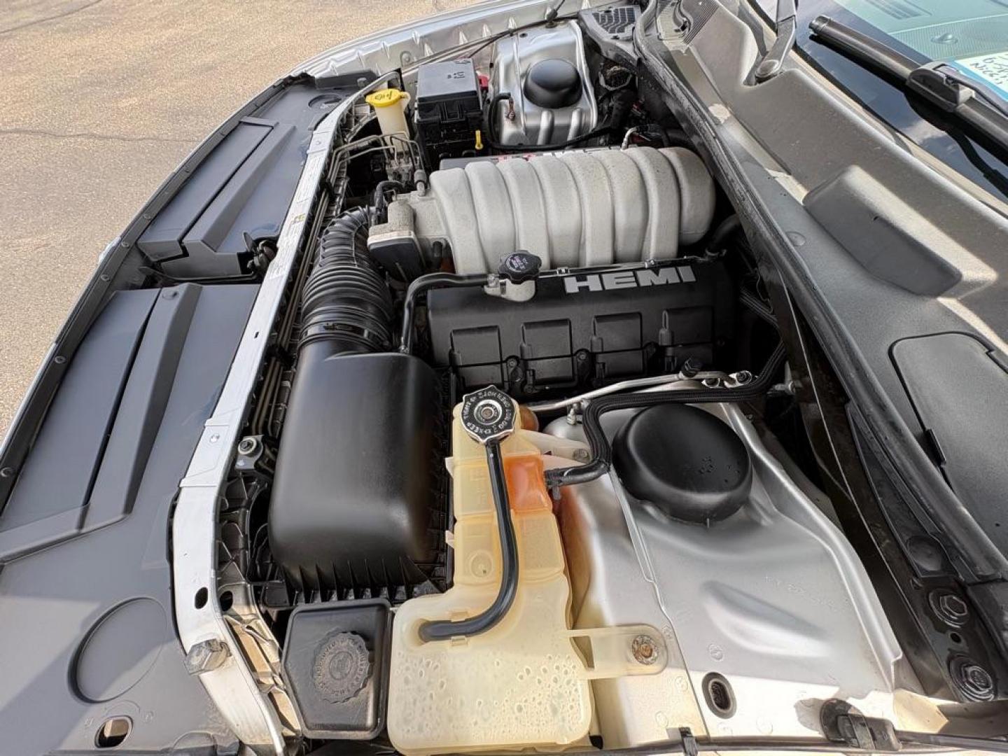 2009 SILVER DODGE CHALLENGER SRT-8 (2B3LJ74W59H) with an 6.1L engine, 6-Speed Manual transmission, located at 501 E. Columbia St., Springfield, OH, 45503, (800) 262-7122, 39.925262, -83.801796 - *** SRT 8 *** 6.1L *** Loaded *** 6 Speed Manual *** RWD *** Clean CarFax *** Oil and Filter Chage *** Cabin and Air filter *** Custom Wheels *** Jay North Auto has offered hand picked vehicles since 1965! Our customer's enjoy a NO pressure buying experience with a small town feel. We are a pr - Photo#12