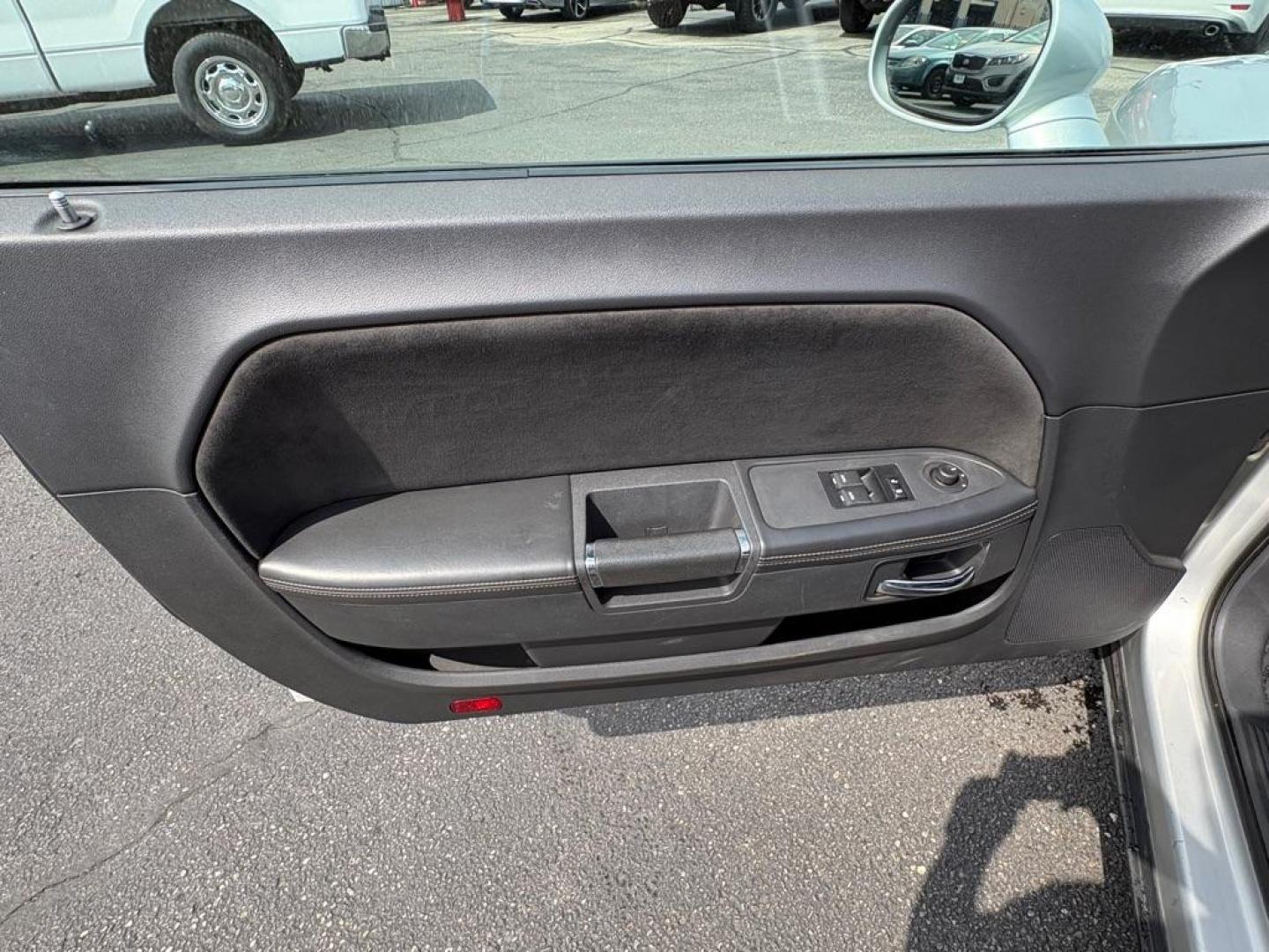 2009 SILVER DODGE CHALLENGER SRT-8 (2B3LJ74W59H) with an 6.1L engine, 6-Speed Manual transmission, located at 501 E. Columbia St., Springfield, OH, 45503, (800) 262-7122, 39.925262, -83.801796 - *** SRT 8 *** 6.1L *** Loaded *** 6 Speed Manual *** RWD *** Clean CarFax *** Oil and Filter Chage *** Cabin and Air filter *** Custom Wheels *** Jay North Auto has offered hand picked vehicles since 1965! Our customer's enjoy a NO pressure buying experience with a small town feel. We are a pr - Photo#13