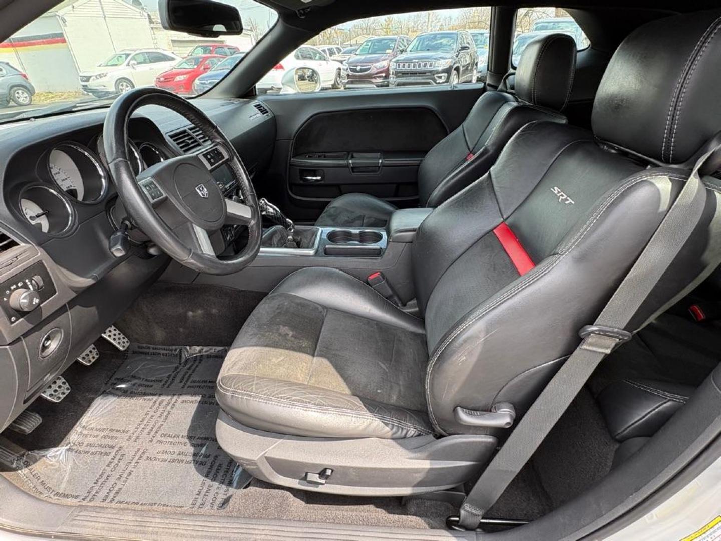 2009 SILVER DODGE CHALLENGER SRT-8 (2B3LJ74W59H) with an 6.1L engine, 6-Speed Manual transmission, located at 501 E. Columbia St., Springfield, OH, 45503, (800) 262-7122, 39.925262, -83.801796 - *** SRT 8 *** 6.1L *** Loaded *** 6 Speed Manual *** RWD *** Clean CarFax *** Oil and Filter Chage *** Cabin and Air filter *** Custom Wheels *** Jay North Auto has offered hand picked vehicles since 1965! Our customer's enjoy a NO pressure buying experience with a small town feel. We are a pr - Photo#14