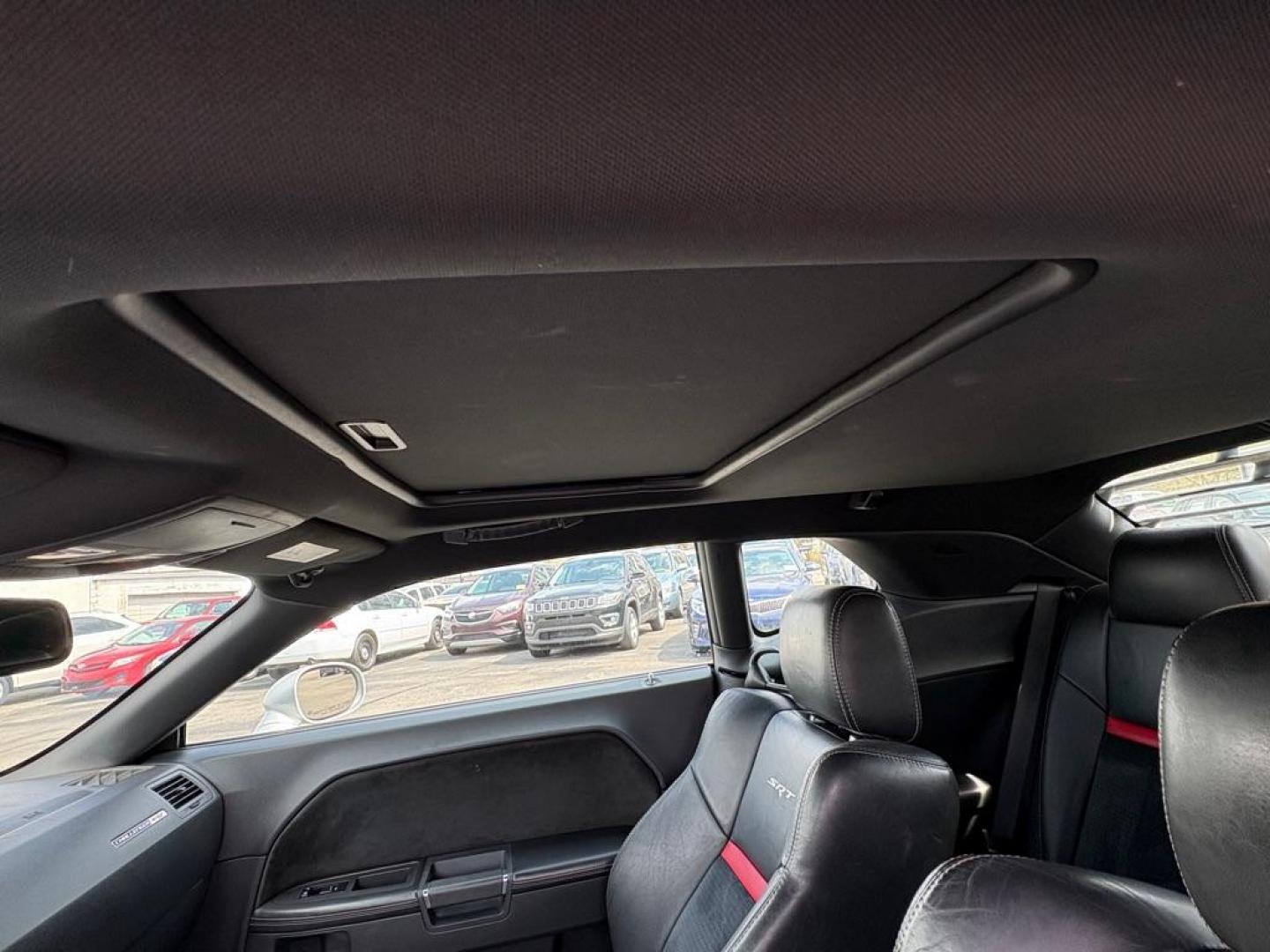 2009 SILVER DODGE CHALLENGER SRT-8 (2B3LJ74W59H) with an 6.1L engine, 6-Speed Manual transmission, located at 501 E. Columbia St., Springfield, OH, 45503, (800) 262-7122, 39.925262, -83.801796 - *** SRT 8 *** 6.1L *** Loaded *** 6 Speed Manual *** RWD *** Clean CarFax *** Oil and Filter Chage *** Cabin and Air filter *** Custom Wheels *** Jay North Auto has offered hand picked vehicles since 1965! Our customer's enjoy a NO pressure buying experience with a small town feel. We are a pr - Photo#15