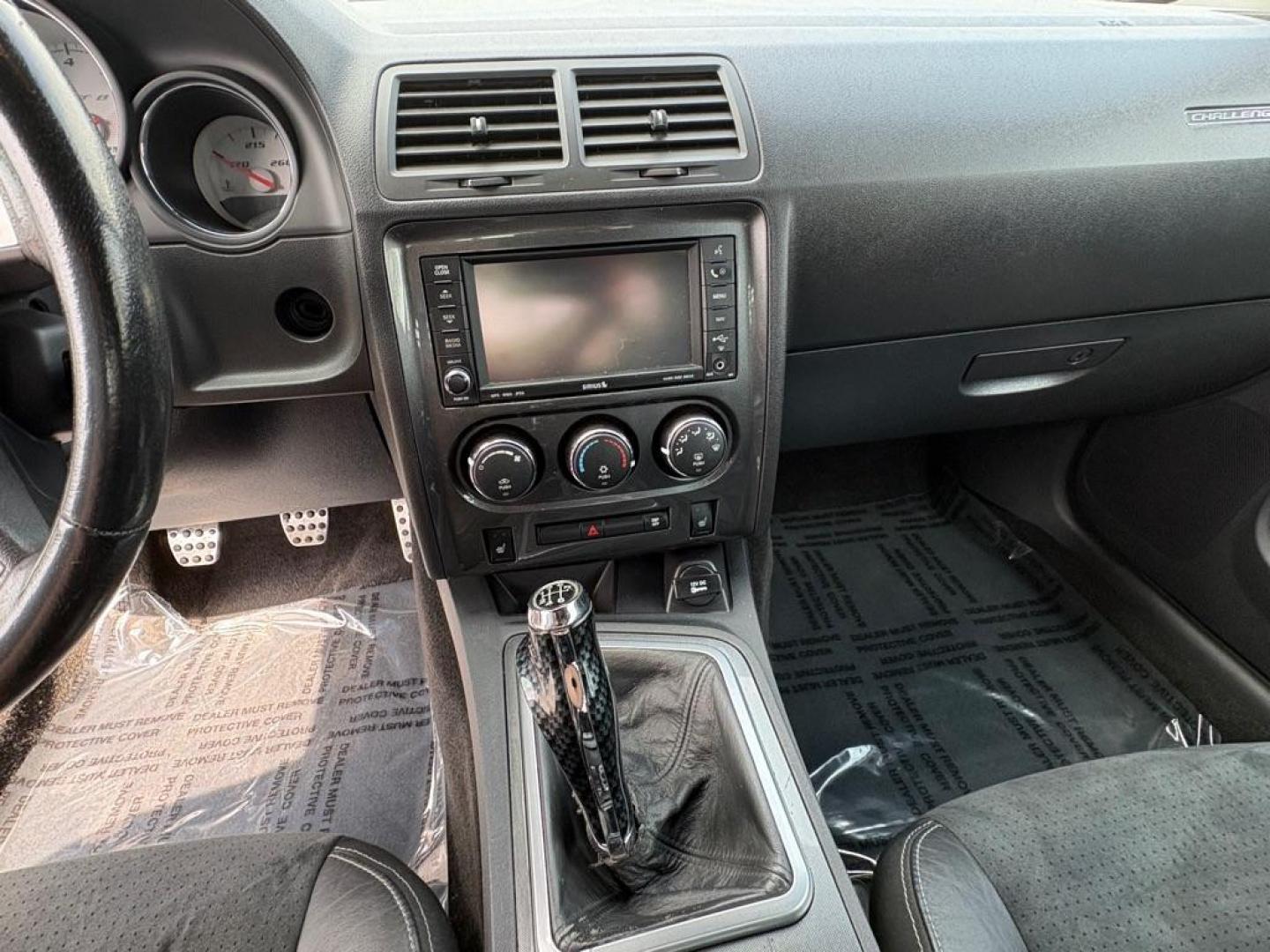 2009 SILVER DODGE CHALLENGER SRT-8 (2B3LJ74W59H) with an 6.1L engine, 6-Speed Manual transmission, located at 501 E. Columbia St., Springfield, OH, 45503, (800) 262-7122, 39.925262, -83.801796 - *** SRT 8 *** 6.1L *** Loaded *** 6 Speed Manual *** RWD *** Clean CarFax *** Oil and Filter Chage *** Cabin and Air filter *** Custom Wheels *** Jay North Auto has offered hand picked vehicles since 1965! Our customer's enjoy a NO pressure buying experience with a small town feel. We are a pr - Photo#16