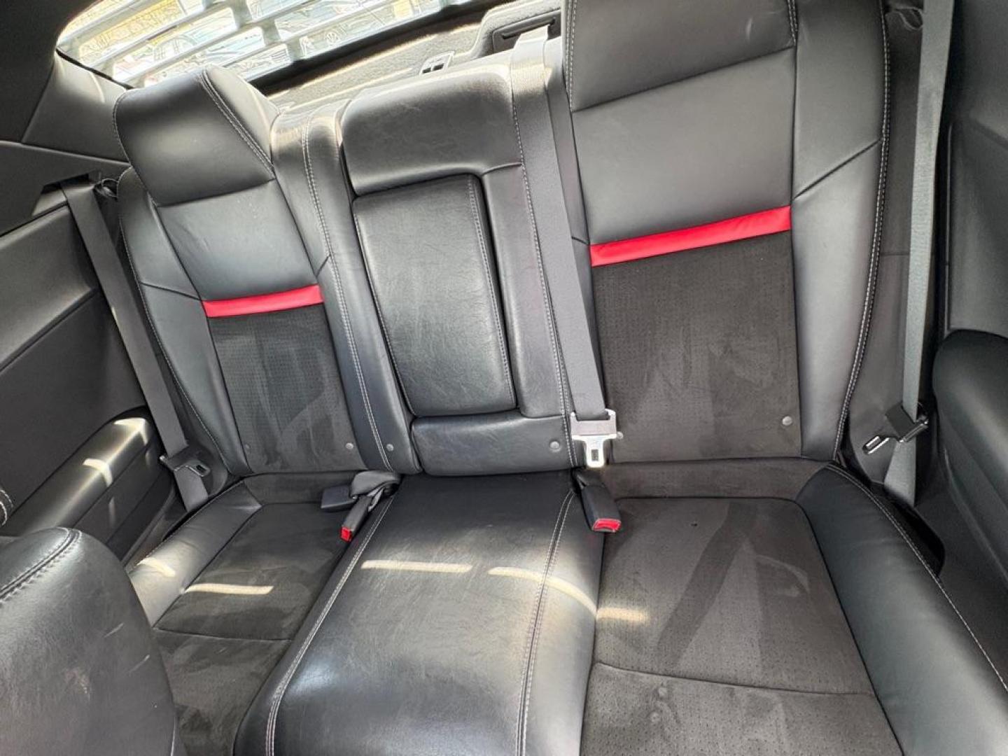 2009 SILVER DODGE CHALLENGER SRT-8 (2B3LJ74W59H) with an 6.1L engine, 6-Speed Manual transmission, located at 501 E. Columbia St., Springfield, OH, 45503, (800) 262-7122, 39.925262, -83.801796 - *** SRT 8 *** 6.1L *** Loaded *** 6 Speed Manual *** RWD *** Clean CarFax *** Oil and Filter Chage *** Cabin and Air filter *** Custom Wheels *** Jay North Auto has offered hand picked vehicles since 1965! Our customer's enjoy a NO pressure buying experience with a small town feel. We are a pr - Photo#18