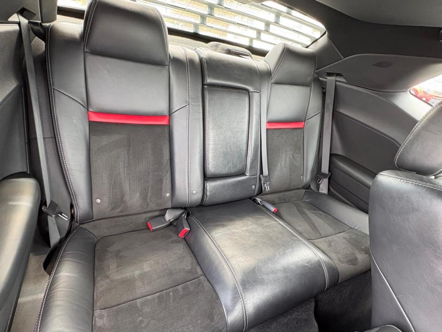 2009 SILVER DODGE CHALLENGER SRT-8 (2B3LJ74W59H) with an 6.1L engine, 6-Speed Manual transmission, located at 501 E. Columbia St., Springfield, OH, 45503, (800) 262-7122, 39.925262, -83.801796 - *** SRT 8 *** 6.1L *** Loaded *** 6 Speed Manual *** RWD *** Clean CarFax *** Oil and Filter Chage *** Cabin and Air filter *** Custom Wheels *** Jay North Auto has offered hand picked vehicles since 1965! Our customer's enjoy a NO pressure buying experience with a small town feel. We are a pr - Photo#21