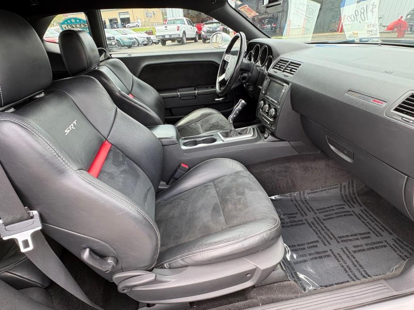 2009 SILVER DODGE CHALLENGER SRT-8 (2B3LJ74W59H) with an 6.1L engine, 6-Speed Manual transmission, located at 501 E. Columbia St., Springfield, OH, 45503, (800) 262-7122, 39.925262, -83.801796 - *** SRT 8 *** 6.1L *** Loaded *** 6 Speed Manual *** RWD *** Clean CarFax *** Oil and Filter Chage *** Cabin and Air filter *** Custom Wheels *** Jay North Auto has offered hand picked vehicles since 1965! Our customer's enjoy a NO pressure buying experience with a small town feel. We are a pr - Photo#23