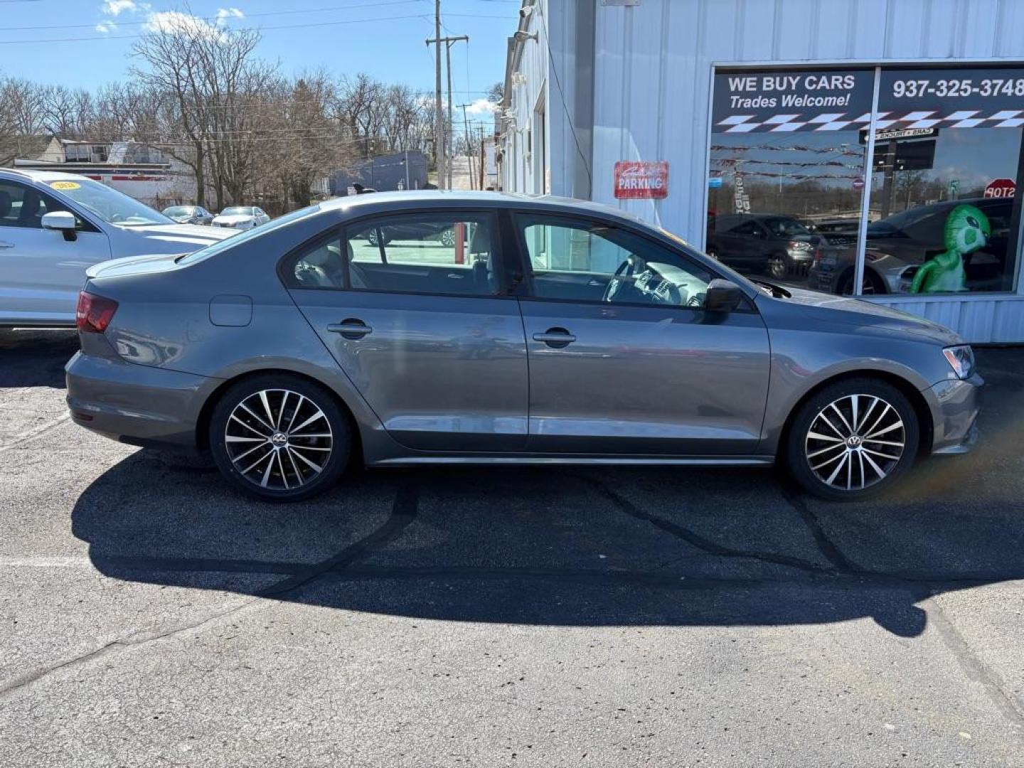 2016 GRAY VOLKSWAGEN JETTA SPORT (3VWB17AJXGM) with an 1.8L engine, 5-Speed Manual transmission, located at 501 E. Columbia St., Springfield, OH, 45503, (800) 262-7122, 39.925262, -83.801796 - ***1-Owner***SPORT***5-Speed Manual***Two-Toned Leather***Heated Seats***New Tires***New Front and Rear Brake Pads and Rotors***New Spark Plugs***New Air Filter and Cabin Air Filter***Fresh Oil Change*** Jay North Auto has offered hand picked vehicles since 1965! Our customer's enjoy a NO press - Photo#1