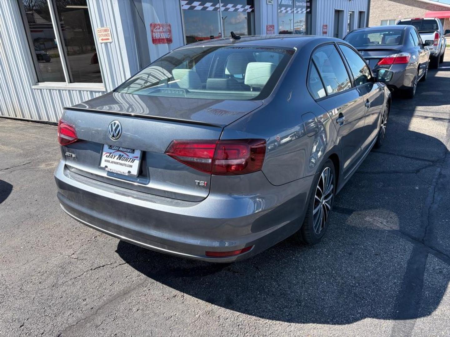 2016 GRAY VOLKSWAGEN JETTA SPORT (3VWB17AJXGM) with an 1.8L engine, 5-Speed Manual transmission, located at 501 E. Columbia St., Springfield, OH, 45503, (800) 262-7122, 39.925262, -83.801796 - ***1-Owner***SPORT***5-Speed Manual***Two-Toned Leather***Heated Seats***New Tires***New Front and Rear Brake Pads and Rotors***New Spark Plugs***New Air Filter and Cabin Air Filter***Fresh Oil Change*** Jay North Auto has offered hand picked vehicles since 1965! Our customer's enjoy a NO press - Photo#2