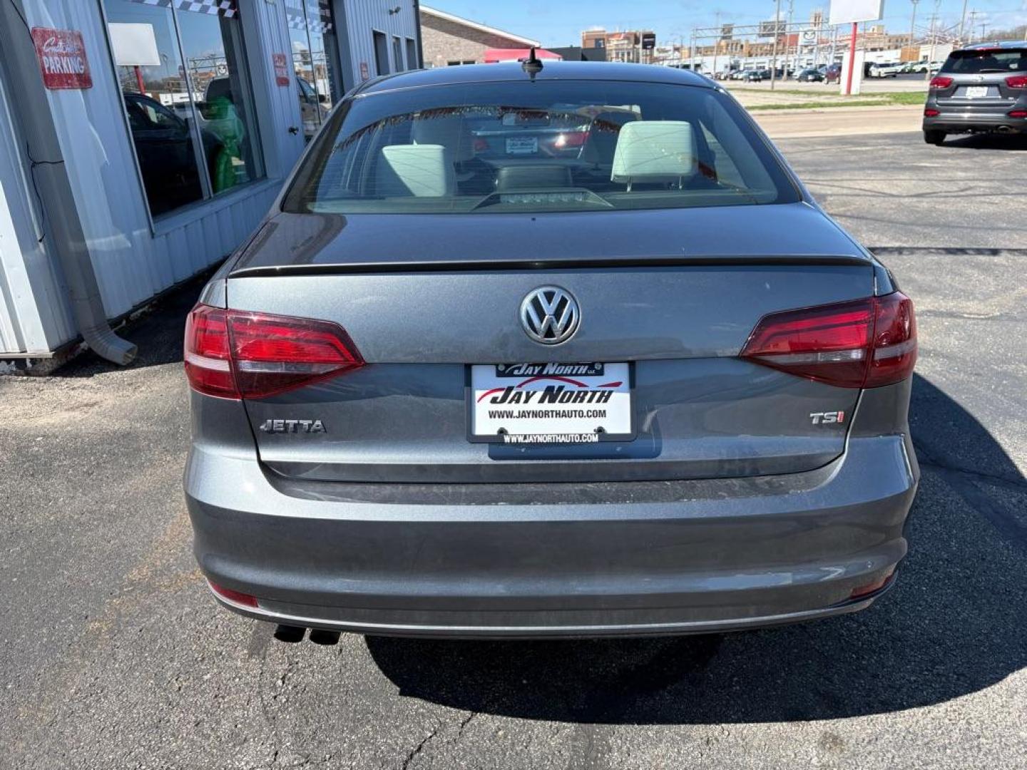 2016 GRAY VOLKSWAGEN JETTA SPORT (3VWB17AJXGM) with an 1.8L engine, 5-Speed Manual transmission, located at 501 E. Columbia St., Springfield, OH, 45503, (800) 262-7122, 39.925262, -83.801796 - ***1-Owner***SPORT***5-Speed Manual***Two-Toned Leather***Heated Seats***New Tires***New Front and Rear Brake Pads and Rotors***New Spark Plugs***New Air Filter and Cabin Air Filter***Fresh Oil Change*** Jay North Auto has offered hand picked vehicles since 1965! Our customer's enjoy a NO press - Photo#3
