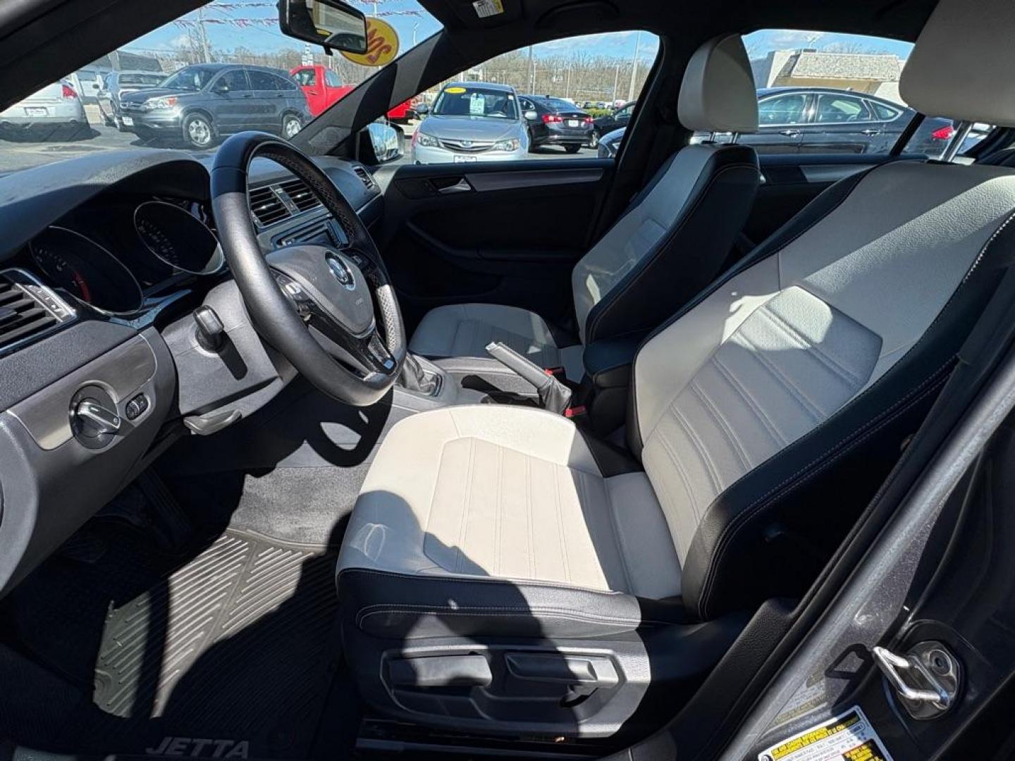 2016 GRAY VOLKSWAGEN JETTA SPORT (3VWB17AJXGM) with an 1.8L engine, 5-Speed Manual transmission, located at 501 E. Columbia St., Springfield, OH, 45503, (800) 262-7122, 39.925262, -83.801796 - ***1-Owner***SPORT***5-Speed Manual***Two-Toned Leather***Heated Seats***New Tires***New Front and Rear Brake Pads and Rotors***New Spark Plugs***New Air Filter and Cabin Air Filter***Fresh Oil Change*** Jay North Auto has offered hand picked vehicles since 1965! Our customer's enjoy a NO press - Photo#8