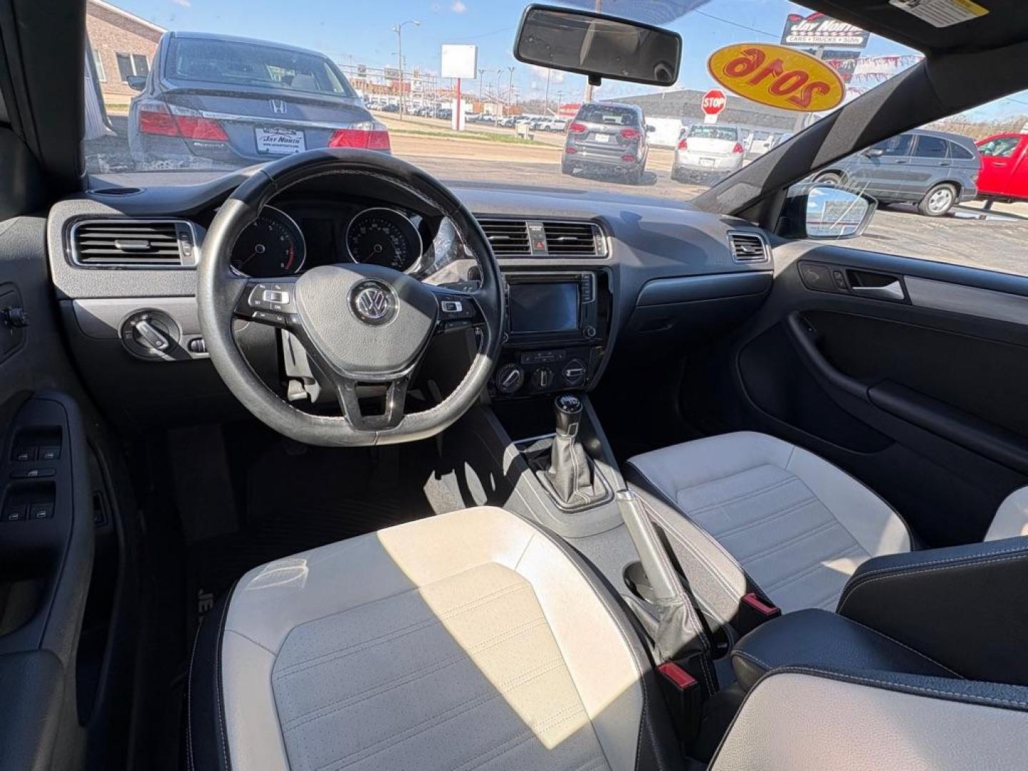 2016 GRAY VOLKSWAGEN JETTA SPORT (3VWB17AJXGM) with an 1.8L engine, 5-Speed Manual transmission, located at 501 E. Columbia St., Springfield, OH, 45503, (800) 262-7122, 39.925262, -83.801796 - ***1-Owner***SPORT***5-Speed Manual***Two-Toned Leather***Heated Seats***New Tires***New Front and Rear Brake Pads and Rotors***New Spark Plugs***New Air Filter and Cabin Air Filter***Fresh Oil Change*** Jay North Auto has offered hand picked vehicles since 1965! Our customer's enjoy a NO press - Photo#9