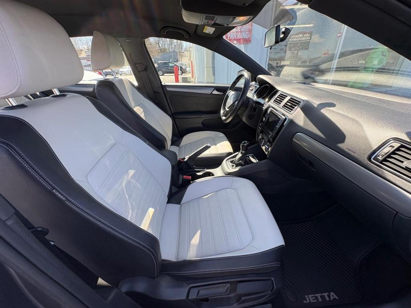 2016 GRAY VOLKSWAGEN JETTA SPORT (3VWB17AJXGM) with an 1.8L engine, 5-Speed Manual transmission, located at 501 E. Columbia St., Springfield, OH, 45503, (800) 262-7122, 39.925262, -83.801796 - ***1-Owner***SPORT***5-Speed Manual***Two-Toned Leather***Heated Seats***New Tires***New Front and Rear Brake Pads and Rotors***New Spark Plugs***New Air Filter and Cabin Air Filter***Fresh Oil Change*** Jay North Auto has offered hand picked vehicles since 1965! Our customer's enjoy a NO press - Photo#16