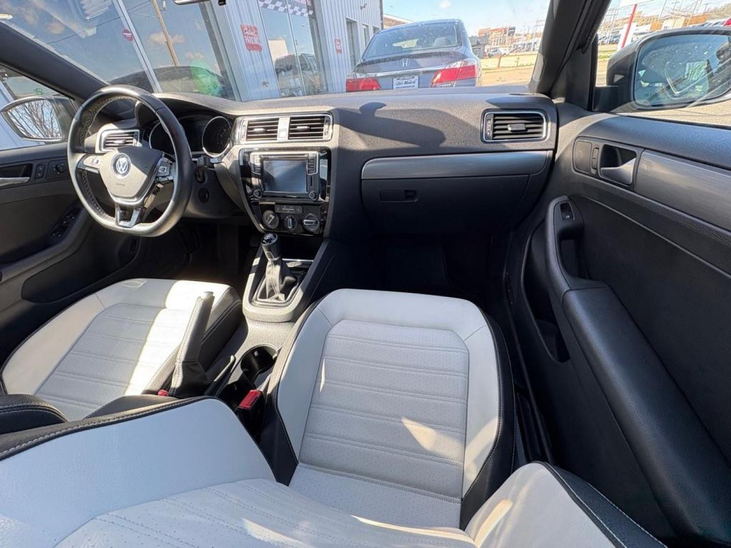 2016 GRAY VOLKSWAGEN JETTA SPORT (3VWB17AJXGM) with an 1.8L engine, 5-Speed Manual transmission, located at 501 E. Columbia St., Springfield, OH, 45503, (800) 262-7122, 39.925262, -83.801796 - ***1-Owner***SPORT***5-Speed Manual***Two-Toned Leather***Heated Seats***New Tires***New Front and Rear Brake Pads and Rotors***New Spark Plugs***New Air Filter and Cabin Air Filter***Fresh Oil Change*** Jay North Auto has offered hand picked vehicles since 1965! Our customer's enjoy a NO press - Photo#17