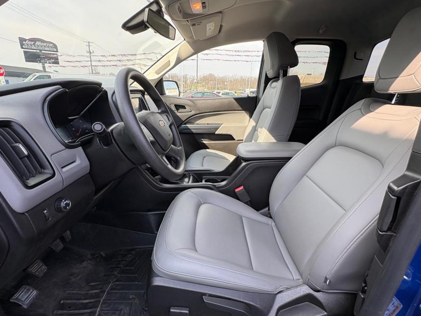 2018 BLUE CHEVROLET COLORADO (1GCHSAEAXJ1) with an 2.5L engine, 6-Speed Manual transmission, located at 501 E. Columbia St., Springfield, OH, 45503, (800) 262-7122, 39.925262, -83.801796 - *** Price Includes Documentation Fee! *** LOW MILES ***** Back Up Camera *** 6 Speed Manual **** Nice!!! *** Oil and filter change **** New Cabin and Air filter *** Jay North Auto has offered hand picked vehicles since 1965! Our customer's enjoy a NO pressure buying experience with a small town - Photo#9