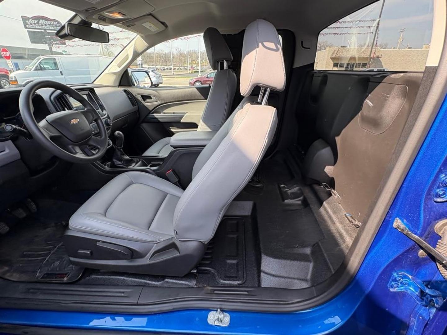 2018 BLUE CHEVROLET COLORADO (1GCHSAEAXJ1) with an 2.5L engine, 6-Speed Manual transmission, located at 501 E. Columbia St., Springfield, OH, 45503, (800) 262-7122, 39.925262, -83.801796 - *** Price Includes Documentation Fee! *** LOW MILES ***** Back Up Camera *** 6 Speed Manual **** Nice!!! *** Oil and filter change **** New Cabin and Air filter *** Jay North Auto has offered hand picked vehicles since 1965! Our customer's enjoy a NO pressure buying experience with a small town - Photo#11